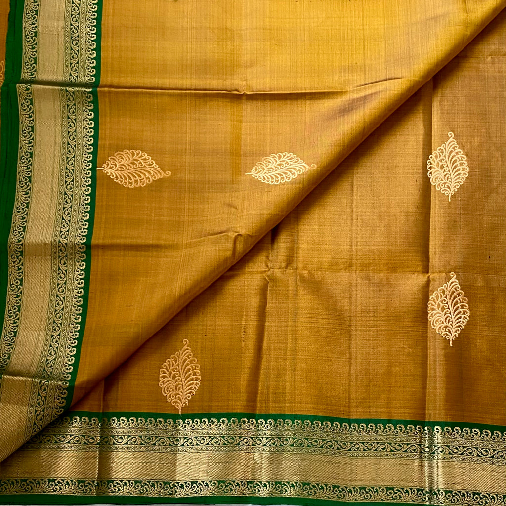 Magical Mustard Brocade Borders on Handloom Designer Pure Silk with stunner Green