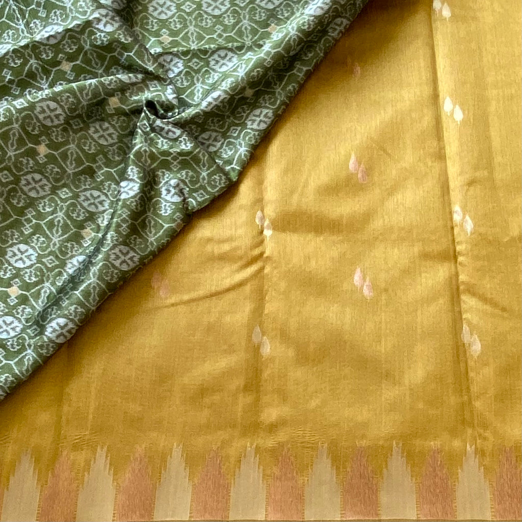 Mustard gold soft tussar with olive green ikkat pallu & temple borders