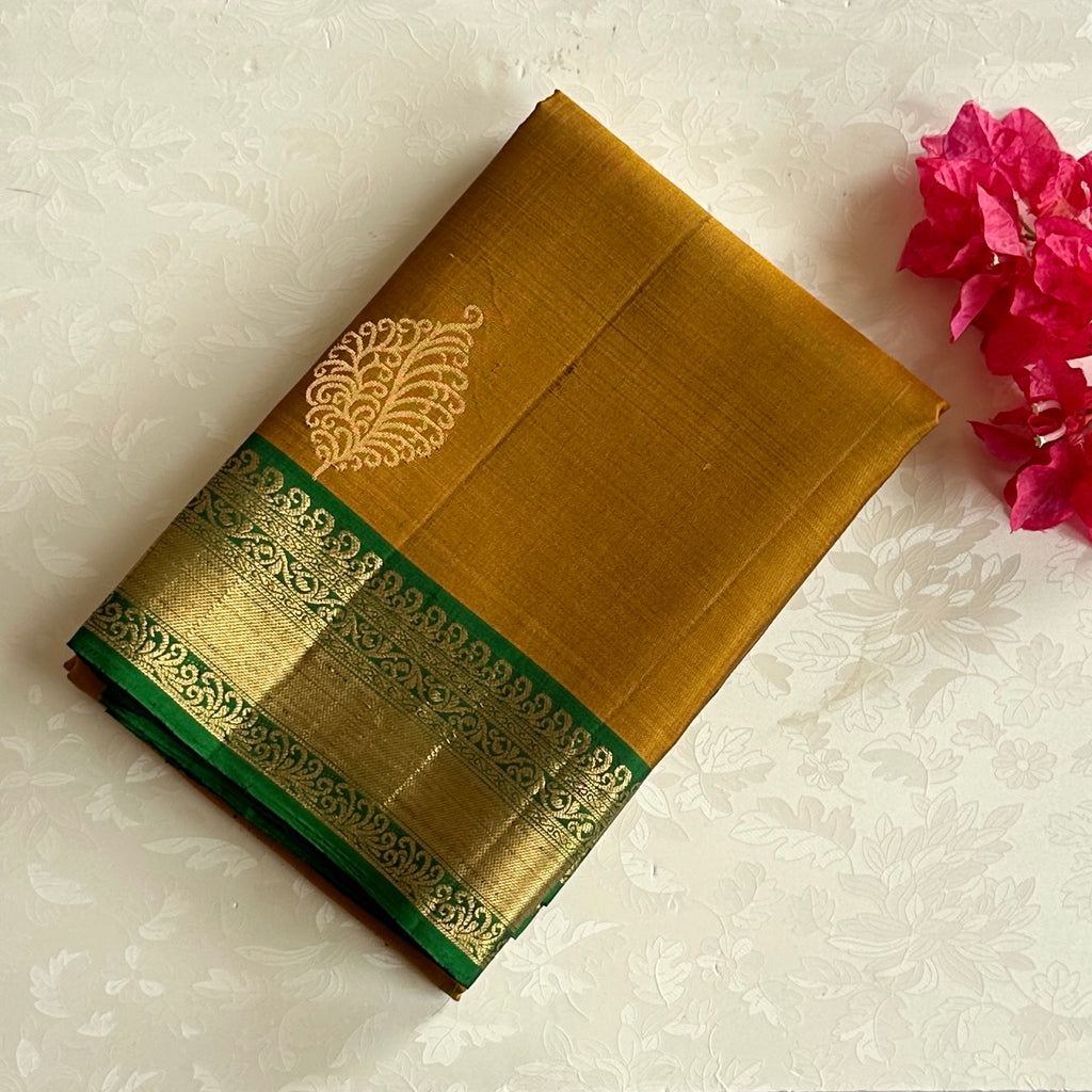 Magical Mustard Brocade Borders on Handloom Designer Pure Silk with stunner Green