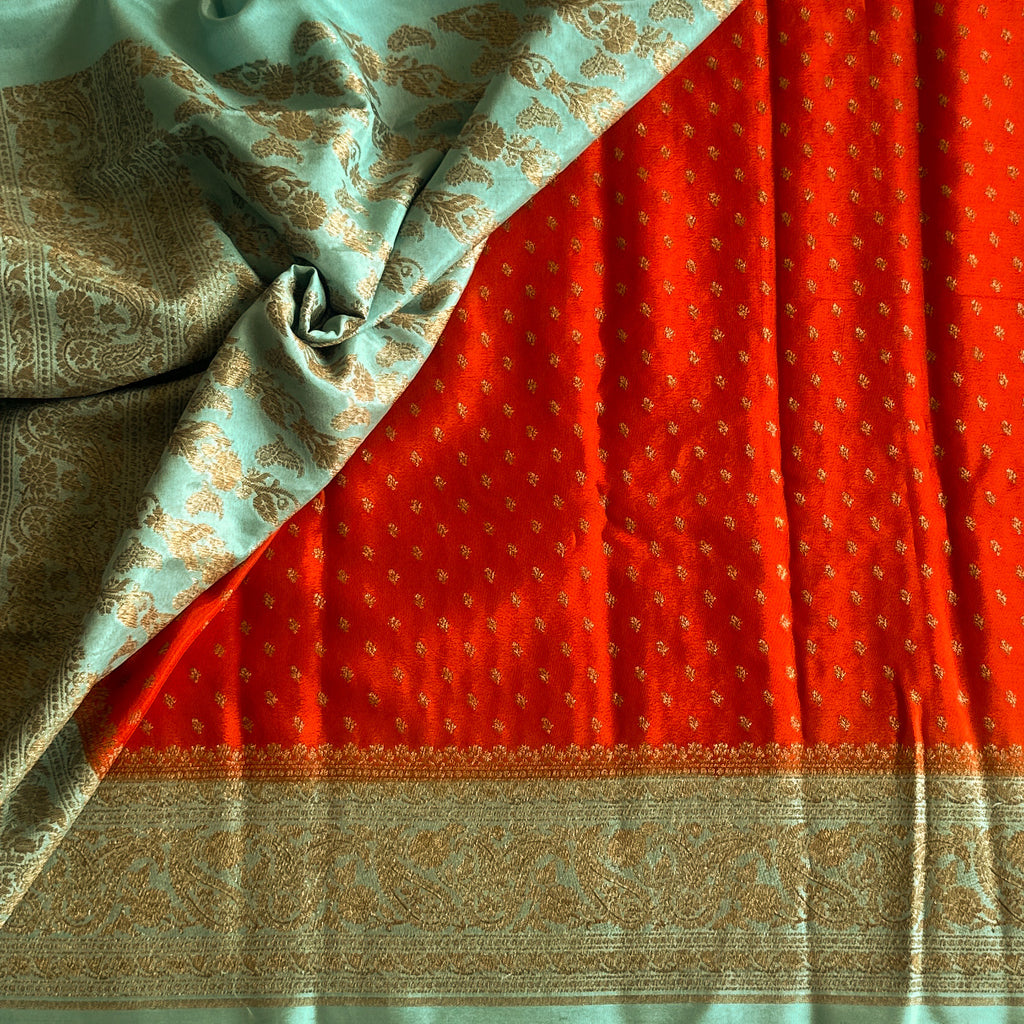 Sunset Orange with aqua blue soft crepe Banarasi with buttas
