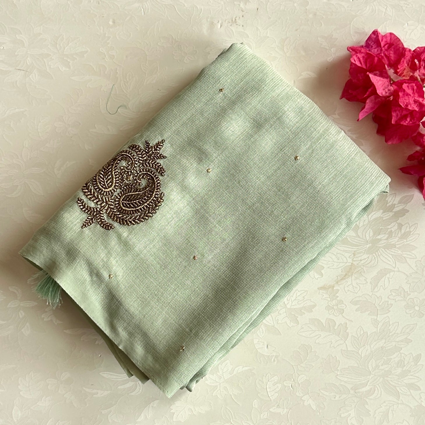 Sage Green Embroidered Saree with Copper Motifs and Tassels Elegant