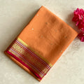 Burnt Orange Zari Border Brocade Saree with Magenta Accent