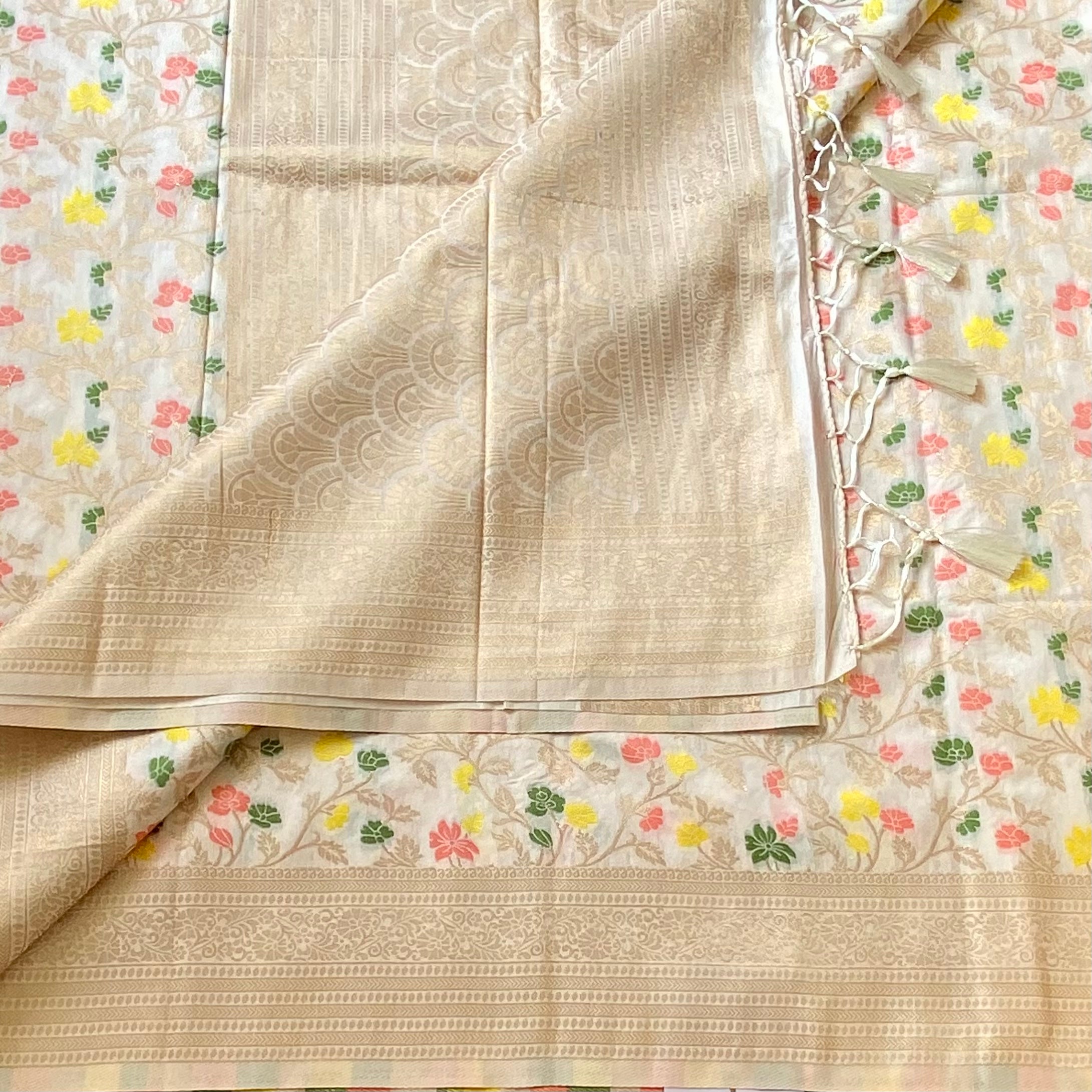 Champagne Gold Brocade Floral Saree With Woven Border Tassels