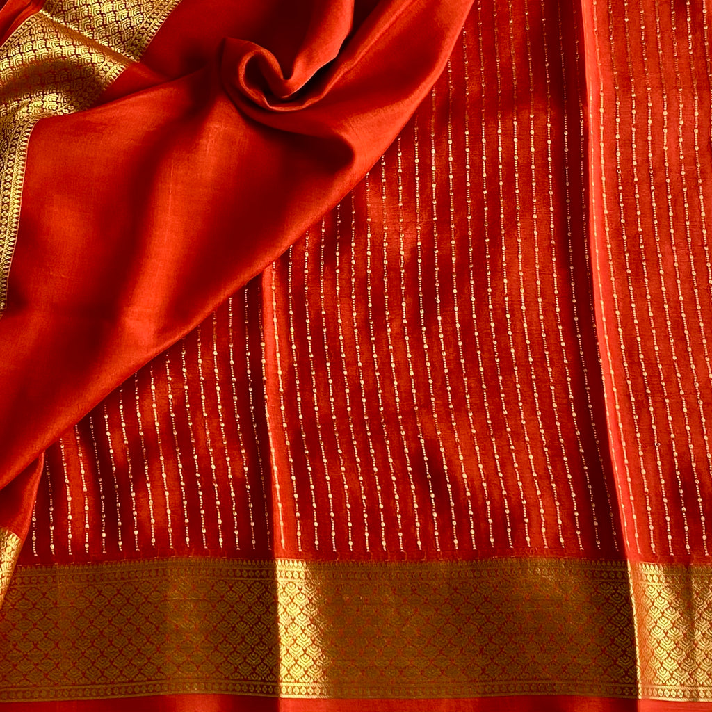 Burnt Orange Mysore Crepe Silk Saree With Metallic Gold Border