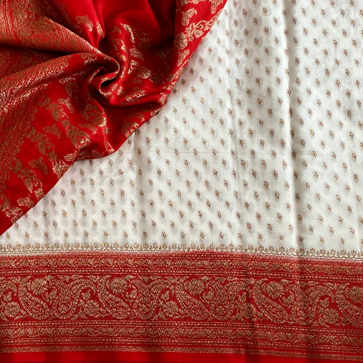 Banarasi Crepe Silk Ivory White & Scarlet Red Saree With Zari Buttas