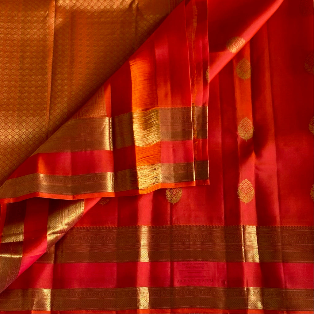 Vibrant Kanakambari Orange Designer Pure Silk Saree With Retta Petta Borders