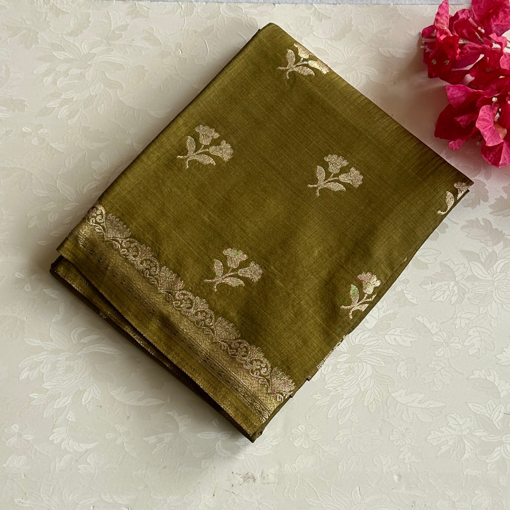 Olive Green soft tussar with antique silver buttas and lotus borders