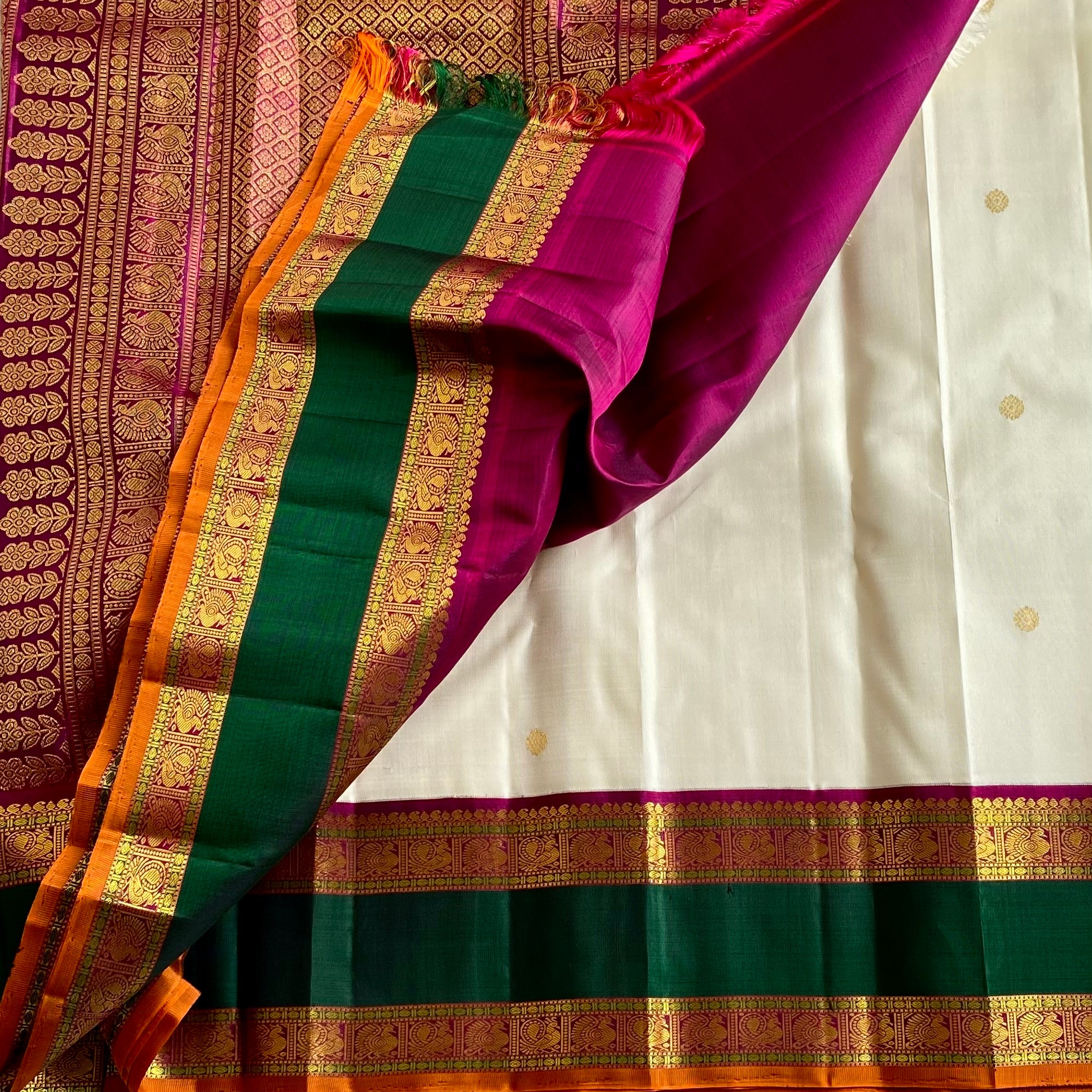 Classy Pearl White With Emerald Green Pure Zari Kanjeevaram Stunner