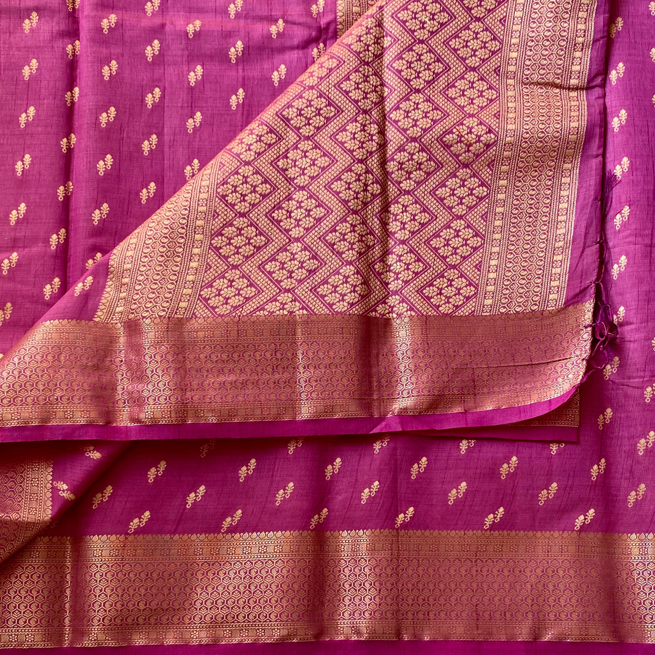 Magenta Brocade Saree with Metallic Gold Pallu Tassel Border Traditional