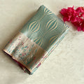 Peach Pink Brocade Saree with Mint Teal Pallu and Zari