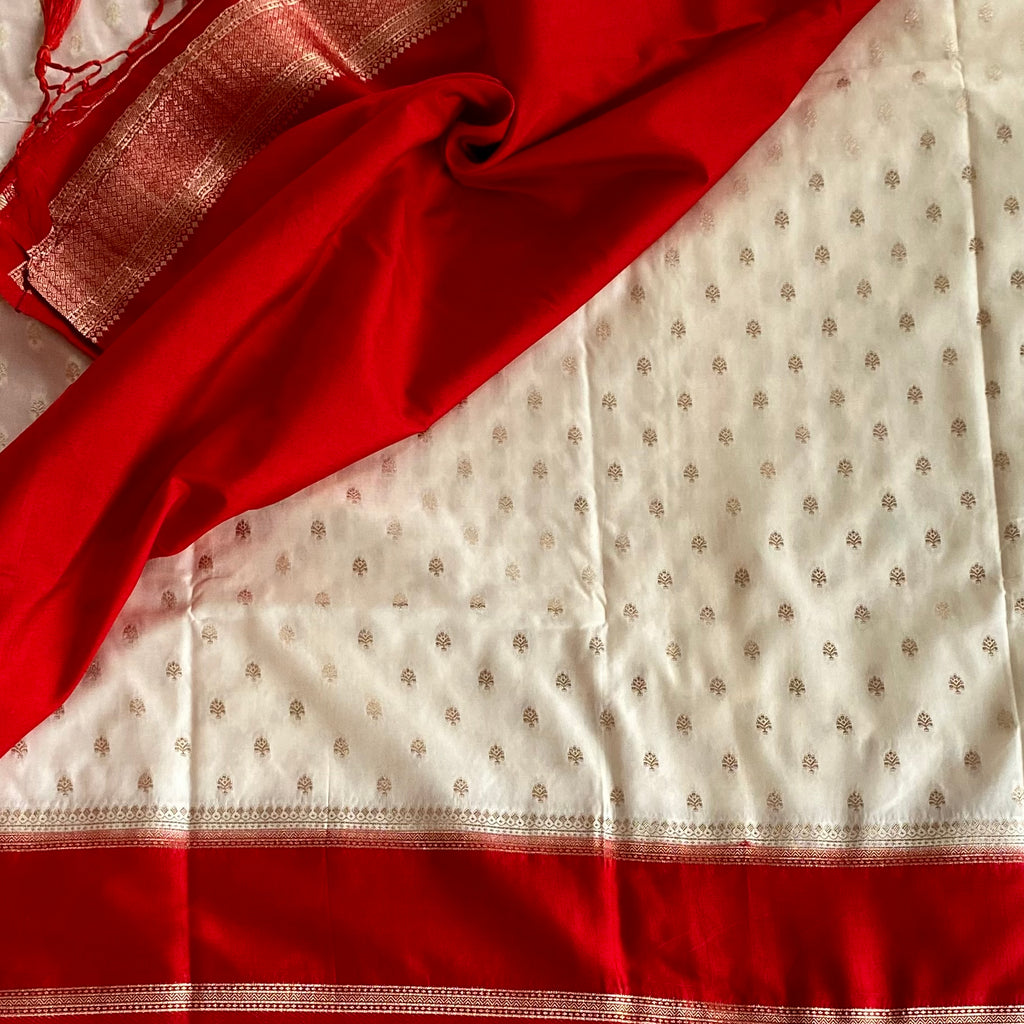 Elegant Ivory Crimson Banarasi Silk Saree Gold Brocade Tassel Border