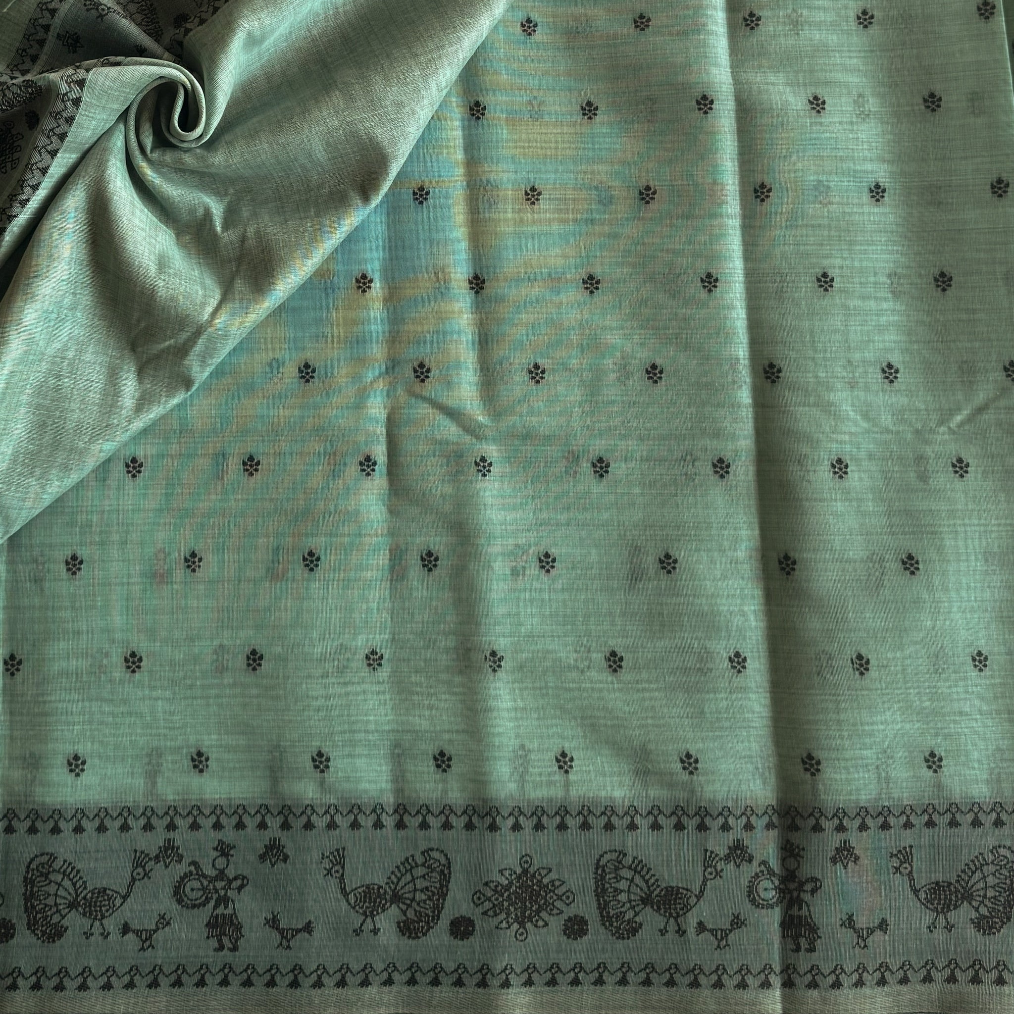Pale Aqua Folk Print Handloom Saree With Peacock Border Tassels