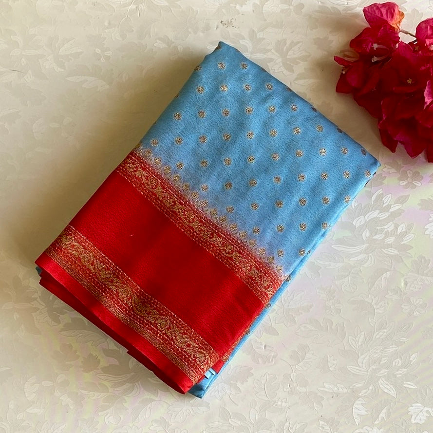 Wonder Sky Blue Banarasi Crepe Silk Saree With Scarlet Red Bordero
