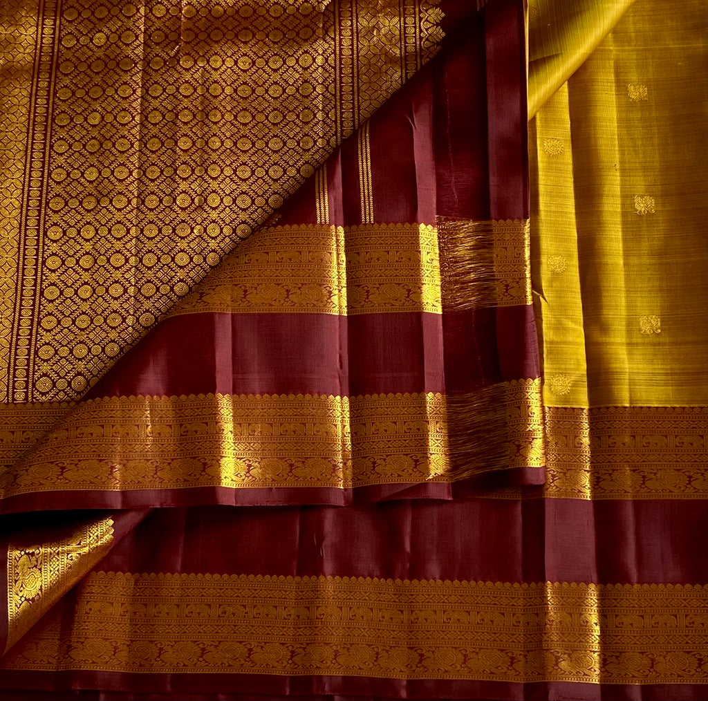 Golden Mustard with deep Wine brown retta petta borders on pure Kanjeevaram
