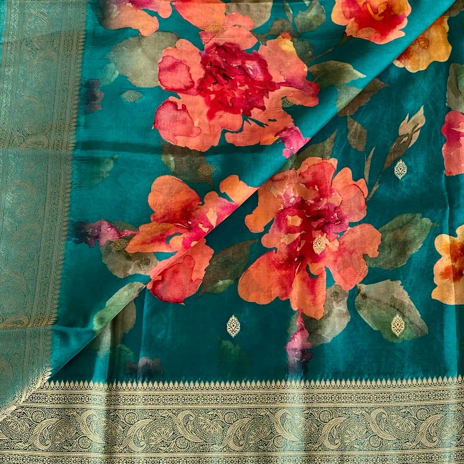 Teal Blue Soft Jute Silk Saree With Rani Pink Floral Pallu