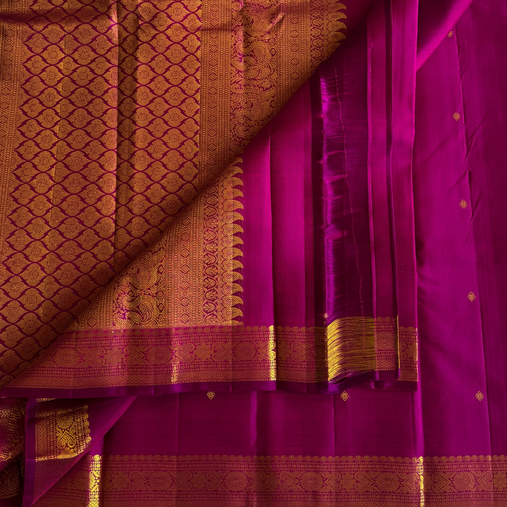 Rich Magenta Kanjeevaram silk with designer Gold Zari Border and Pallu
