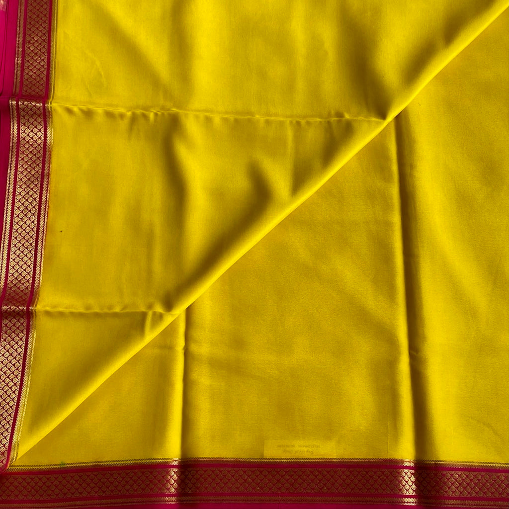 Mustard Yellow Mysore Crepe Silk Saree With Rani Pink Border