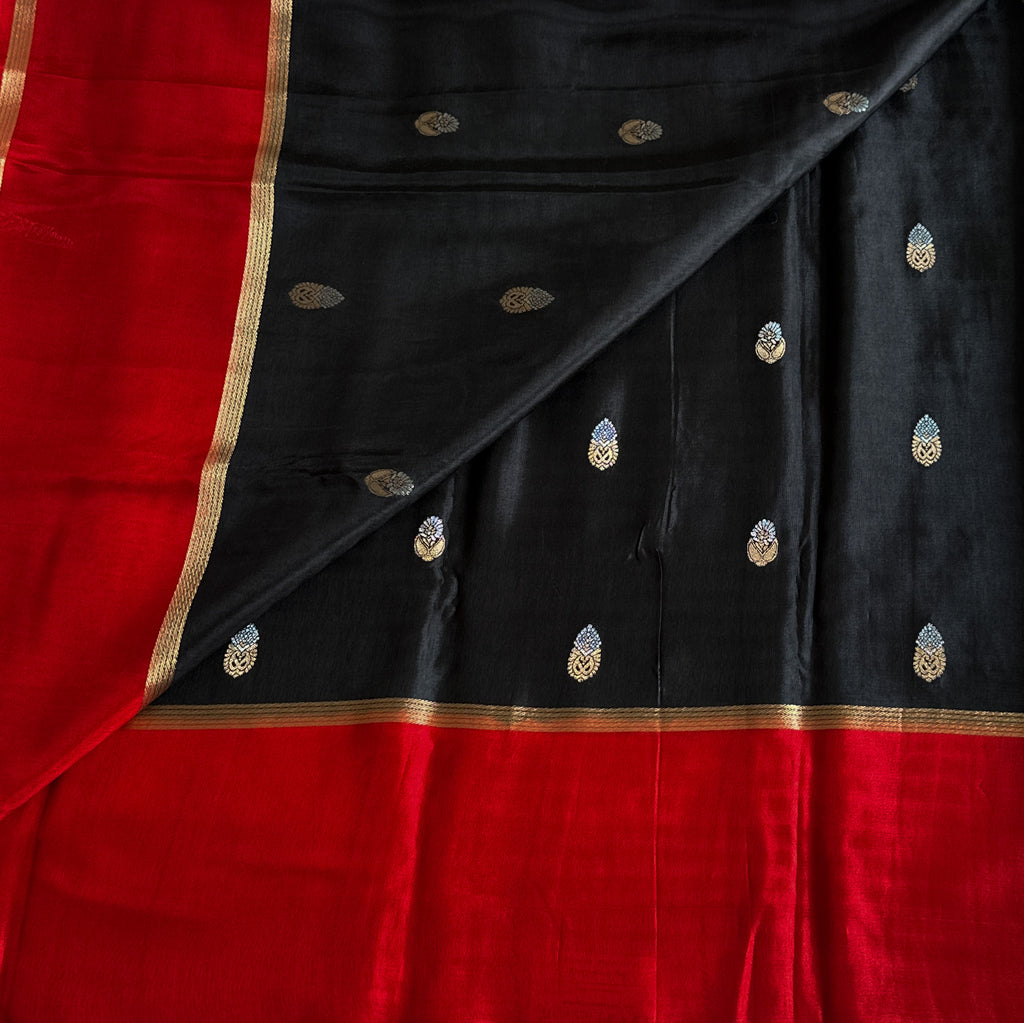 Black with exotic red jute tussar with antique designer zari weave