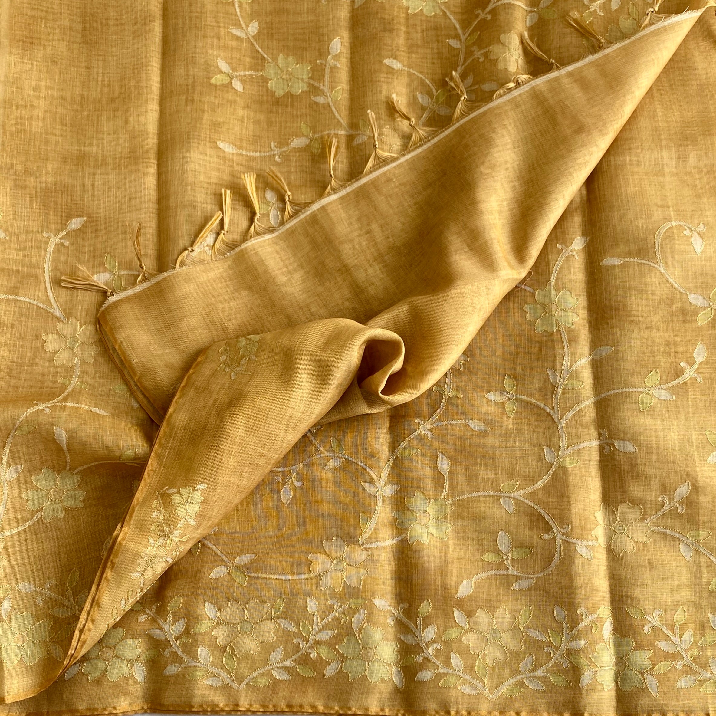 Mustard Yellow Floral Embroidered Saree with Tassel Border Elegant Traditional