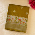 Olive Green Brocade Saree With Floral Pallu And Tassels Elegant