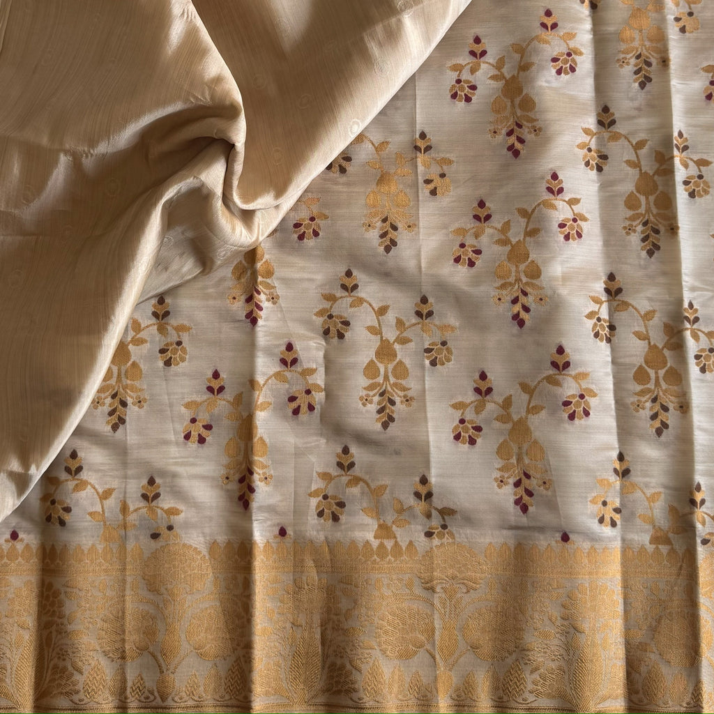 Ivory Gold Woven Silk Saree With Broad Floral Border Tassels