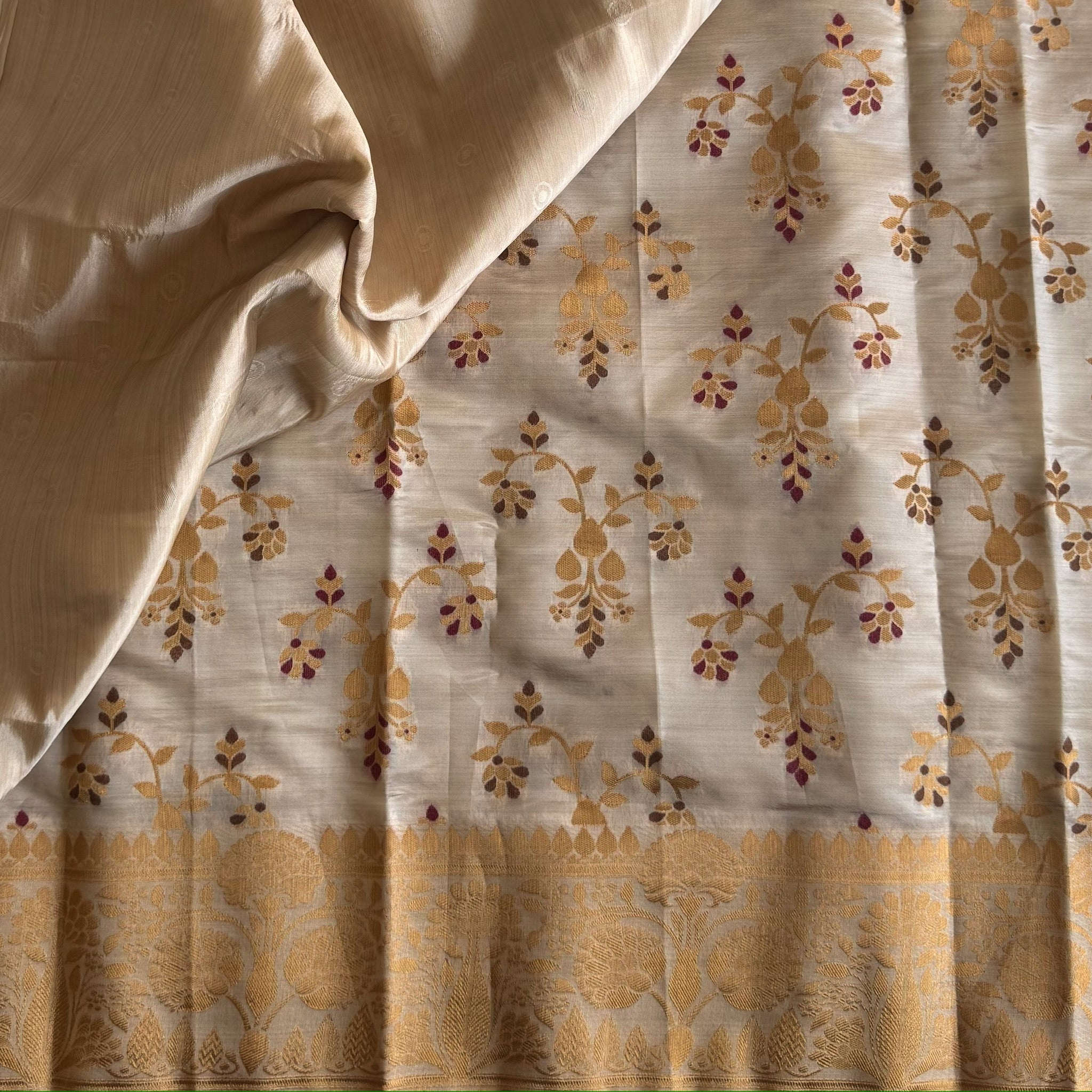 Ivory Gold Woven Silk Saree With Broad Floral Border Tassels