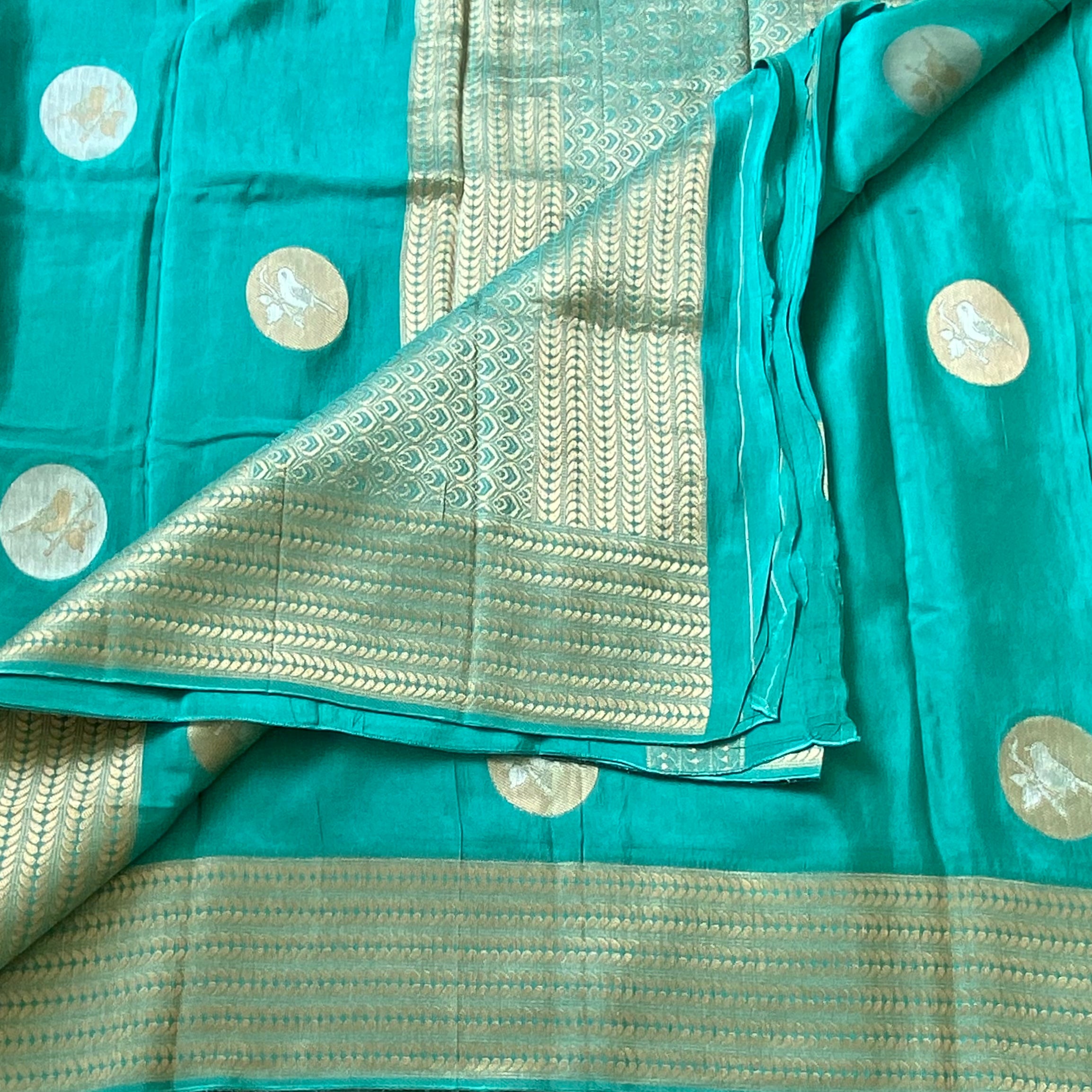 Gorgeous Sea blue designer soft crepe silk with zari buttas