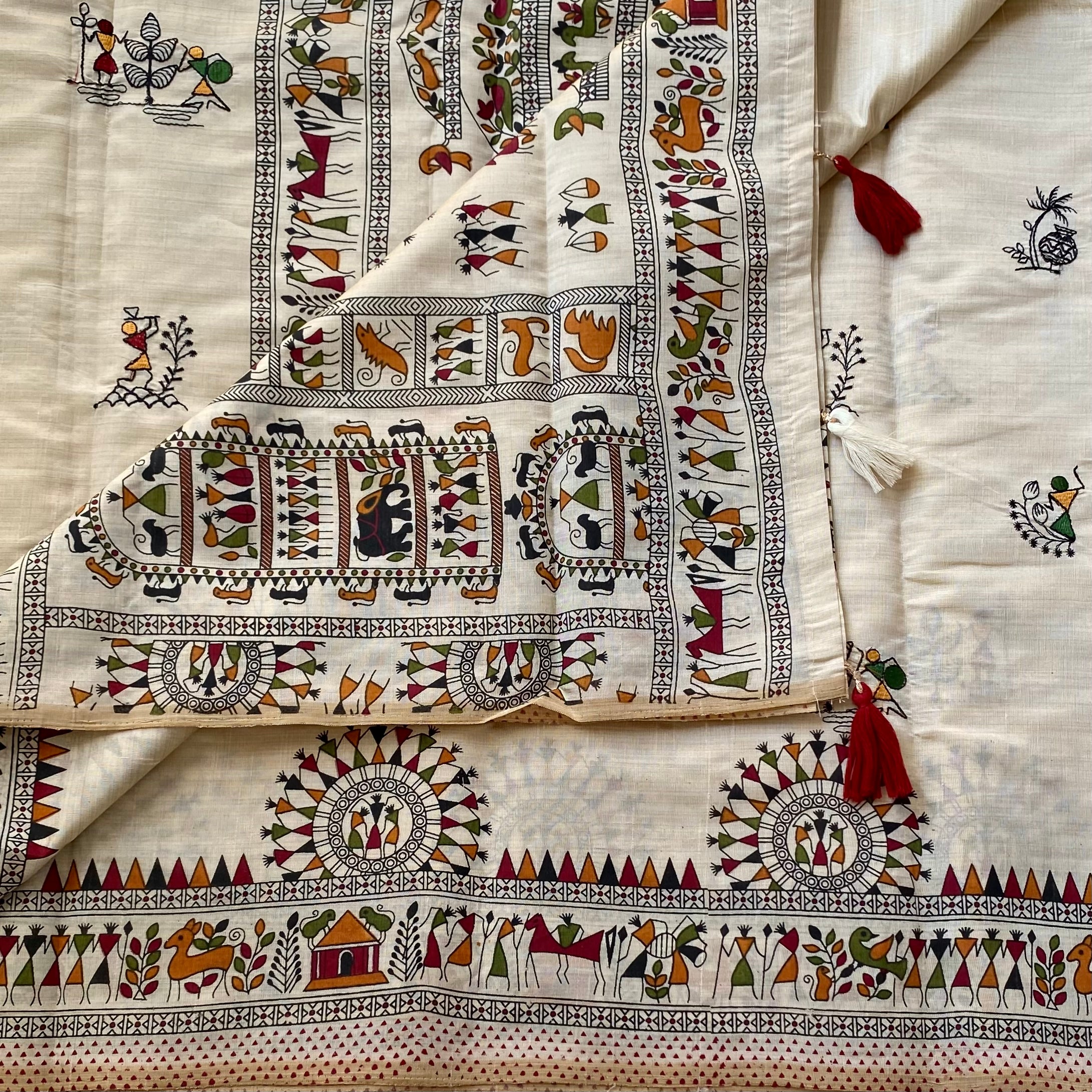 Cream Folk Printed Saree With Maroon Tassel Border For Festivals