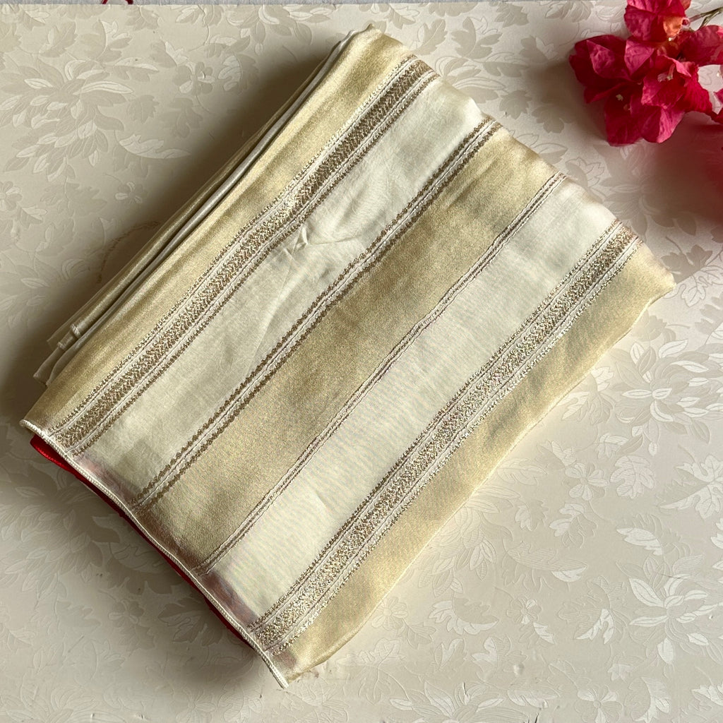 Ivory Blush Silk Saree with Gold Stripes and Medallions Elegant