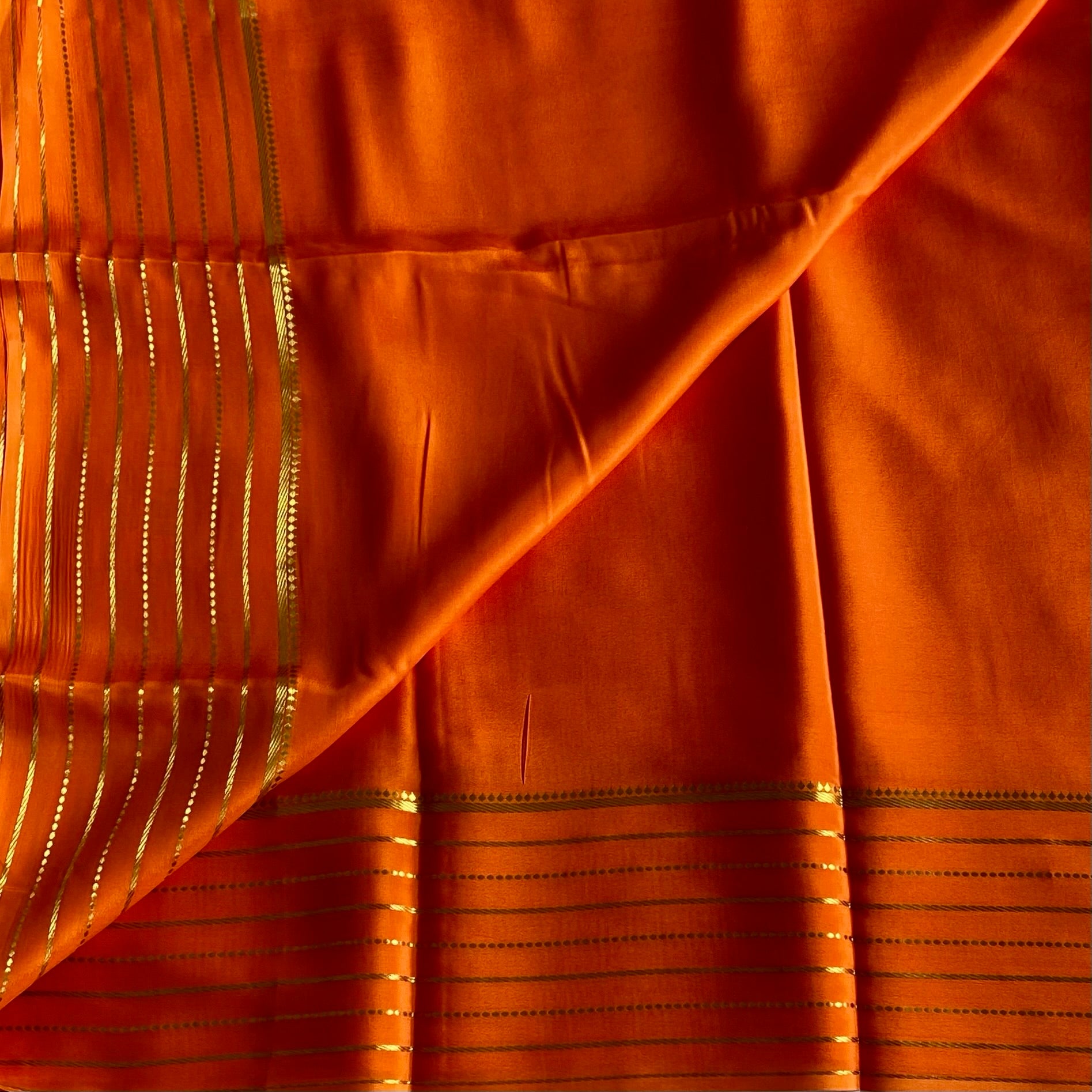 Sunset Orange Mysore Crepe Silk Saree With Metallic Gold Stripes