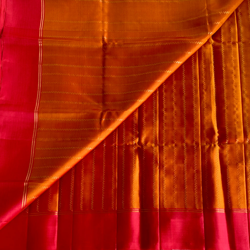 Saffron Orange Designer Pure Silk Saree With Rani Pink Pallu Gold Border