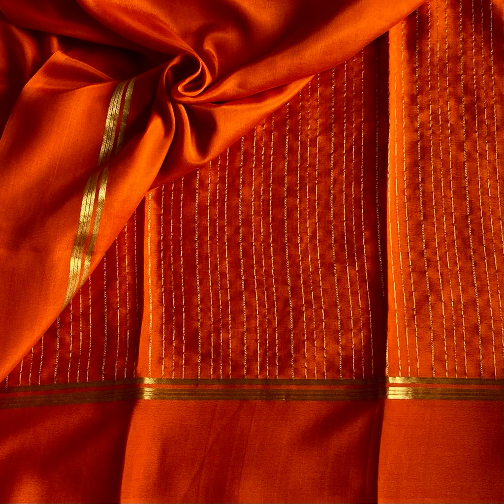 Burnt Orange Mysore Crepe Silk Saree With Metallic Gold Stripes