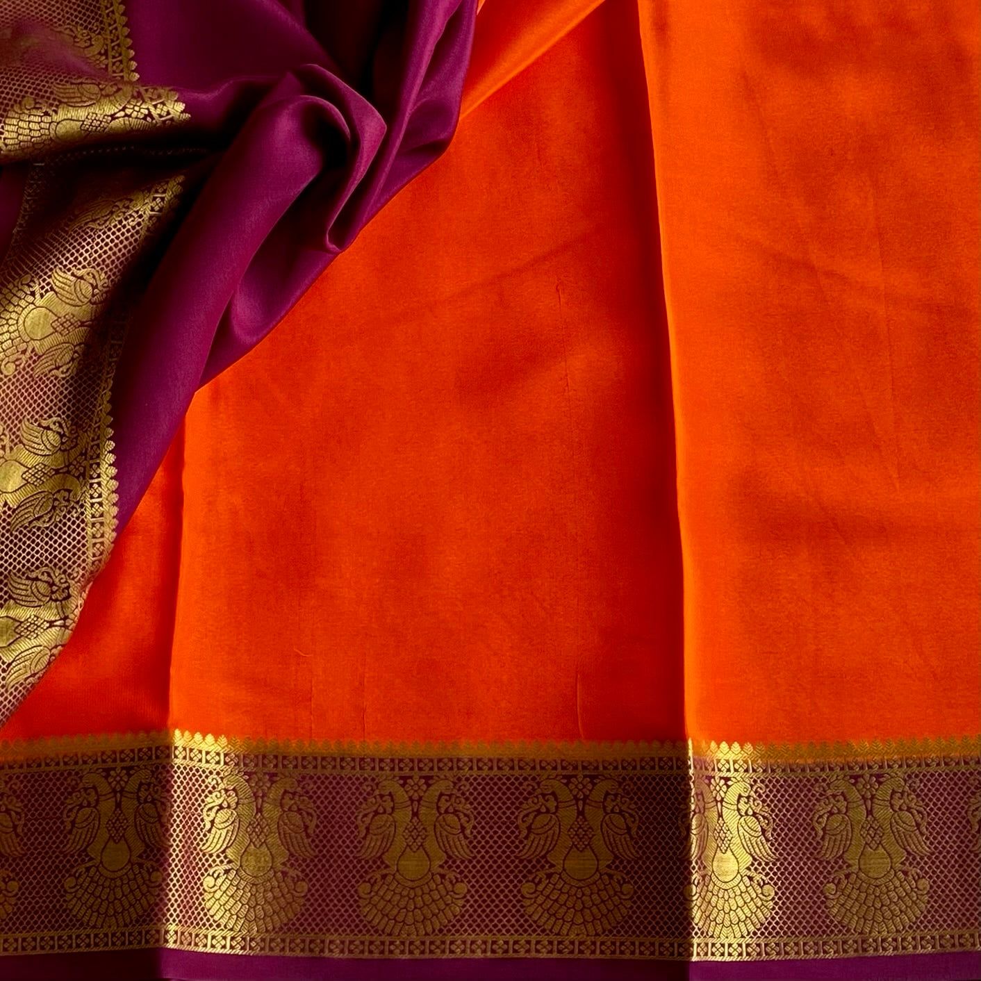 Vibrant Orange Saree Gold Peacock Border Deep Wine Purple Pallu Traditional