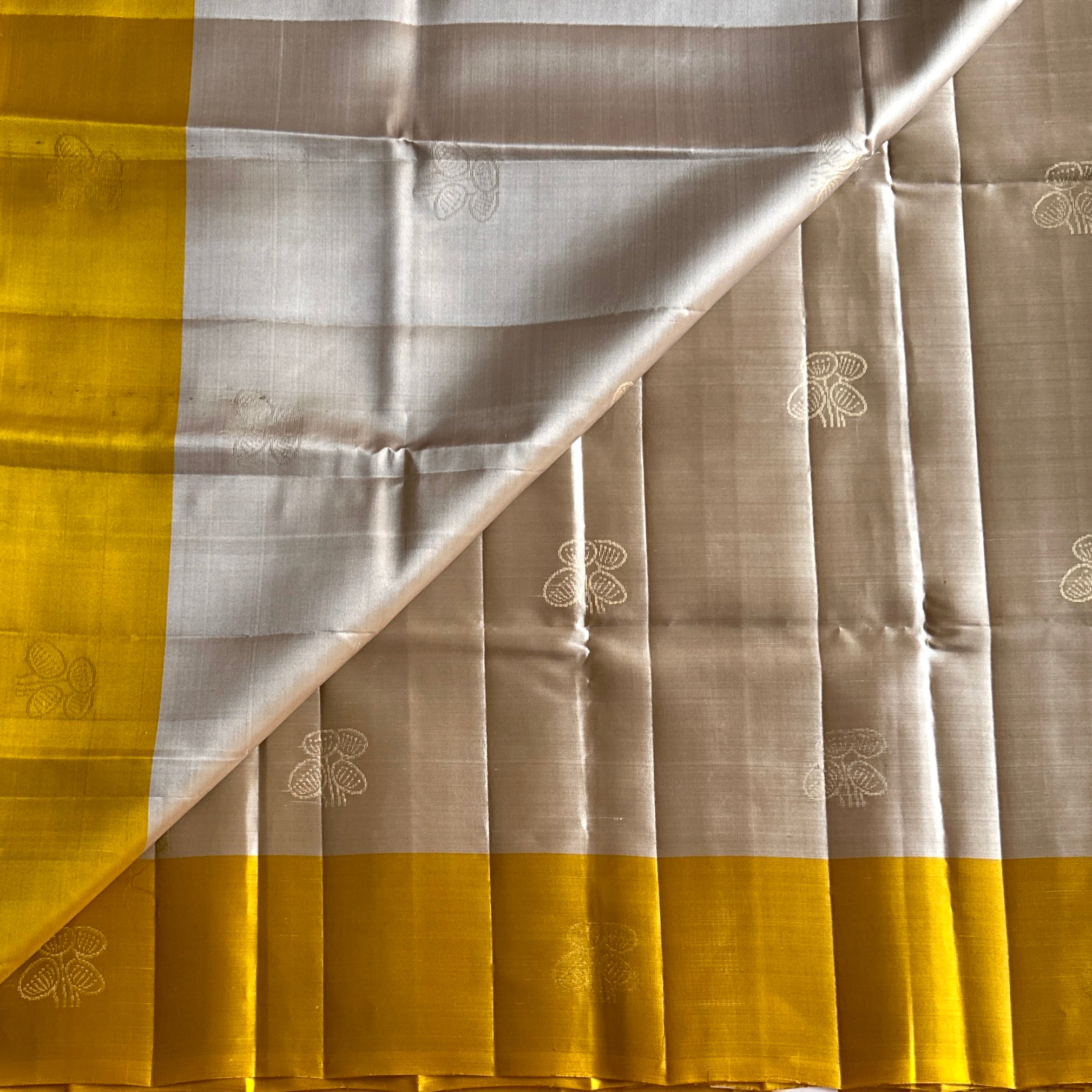 Mustard Yellow Silk Saree with Silver Zari Pallu Floral Motifs