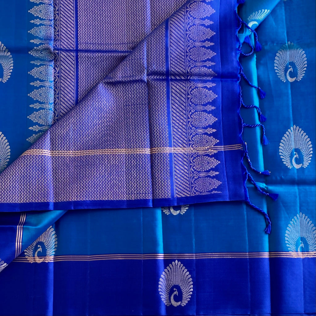 Deep Sky Designer Pure Silk With Royal Pallu & Peacock Buttas