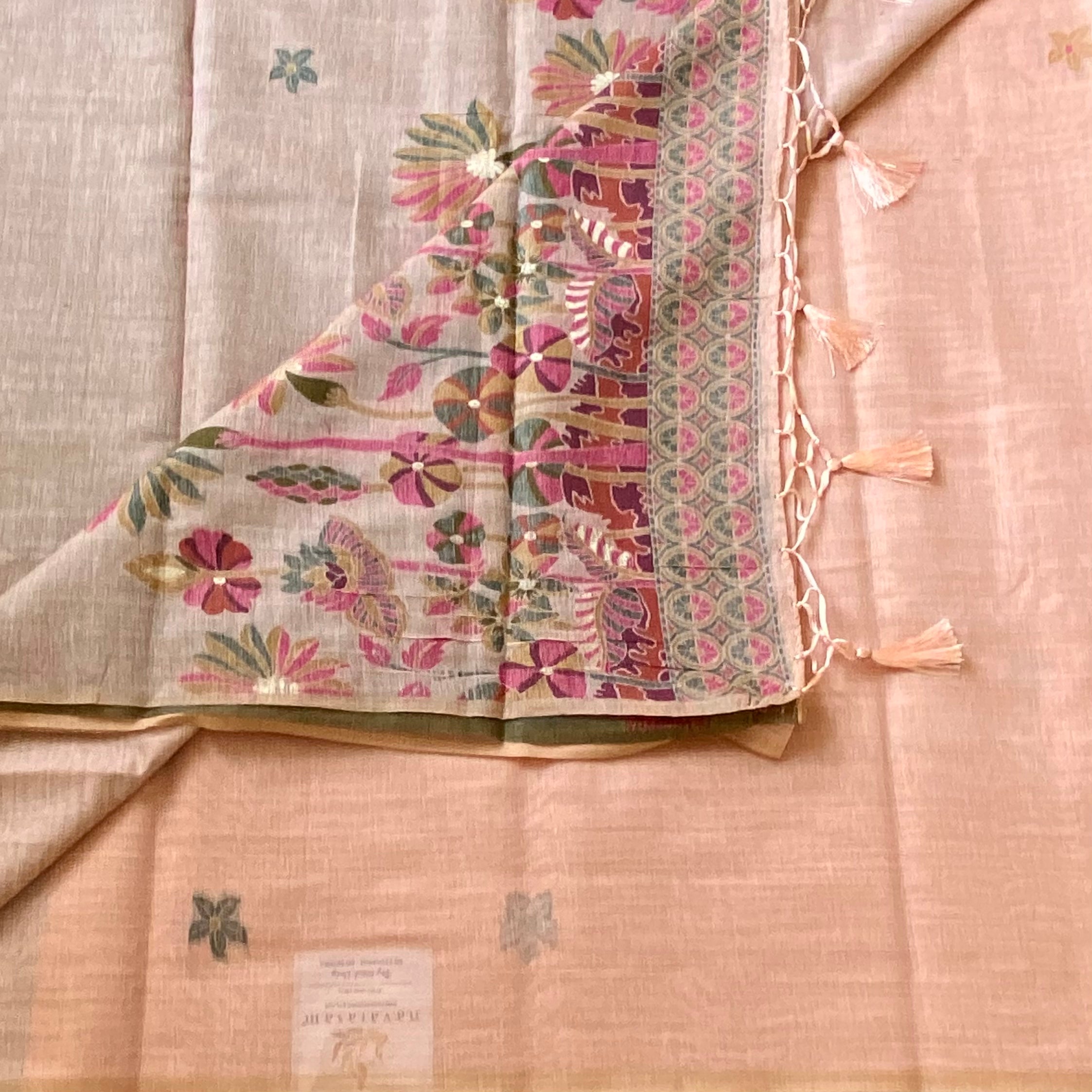 Blush Peach Floral Pallu Saree With Geometric Tassel Border Elegant
