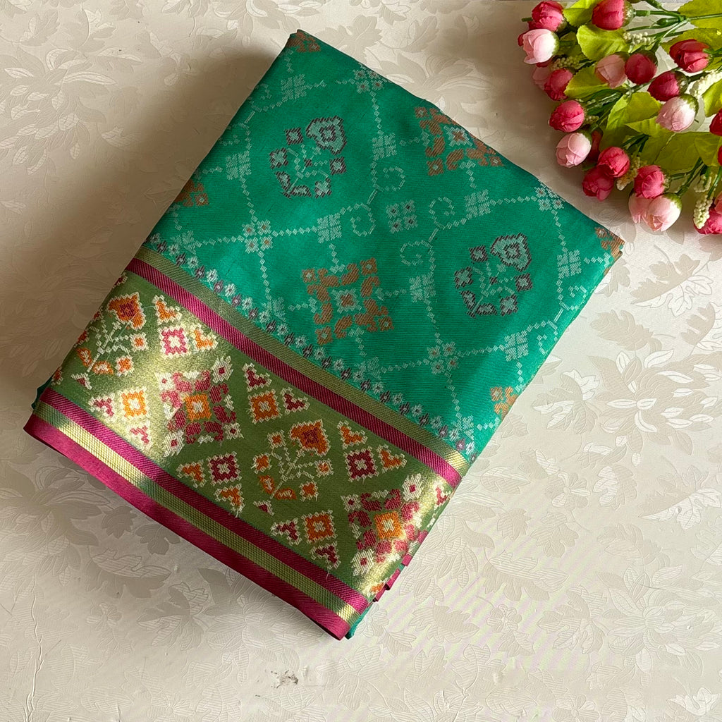 Jewel Green Patola Printed Soft Tussar Silk Saree With Raspberry Pink Pallu