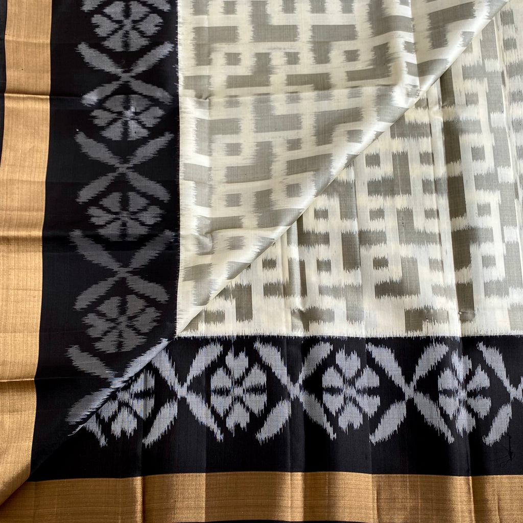 Off White Designer Pure Silk Saree with Jet Black Ikat Gold Border
