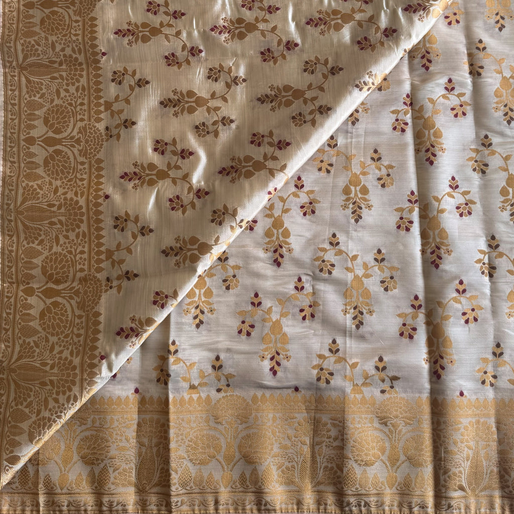 Ivory Gold Woven Silk Saree With Broad Floral Border Tassels