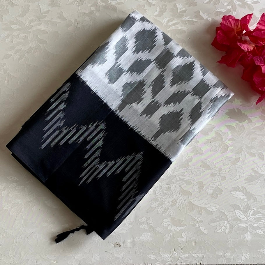 Pearl White And Black Designer Pure Silk Saree With Silver Gray Ikat Border
