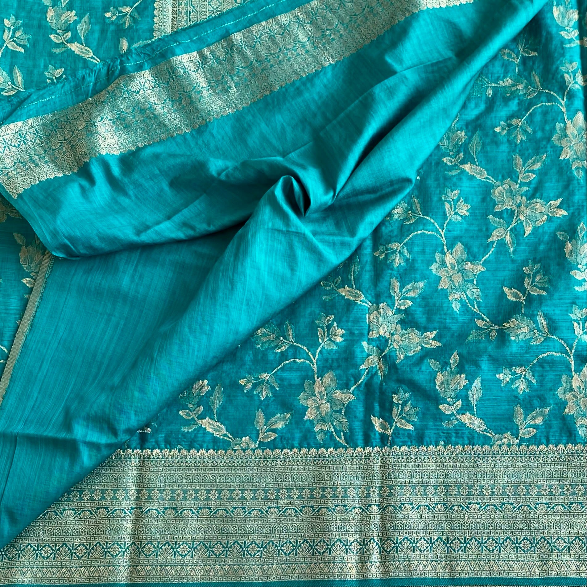 Azure Blue Soft Tussar Silk Saree With Gold Brocade Border