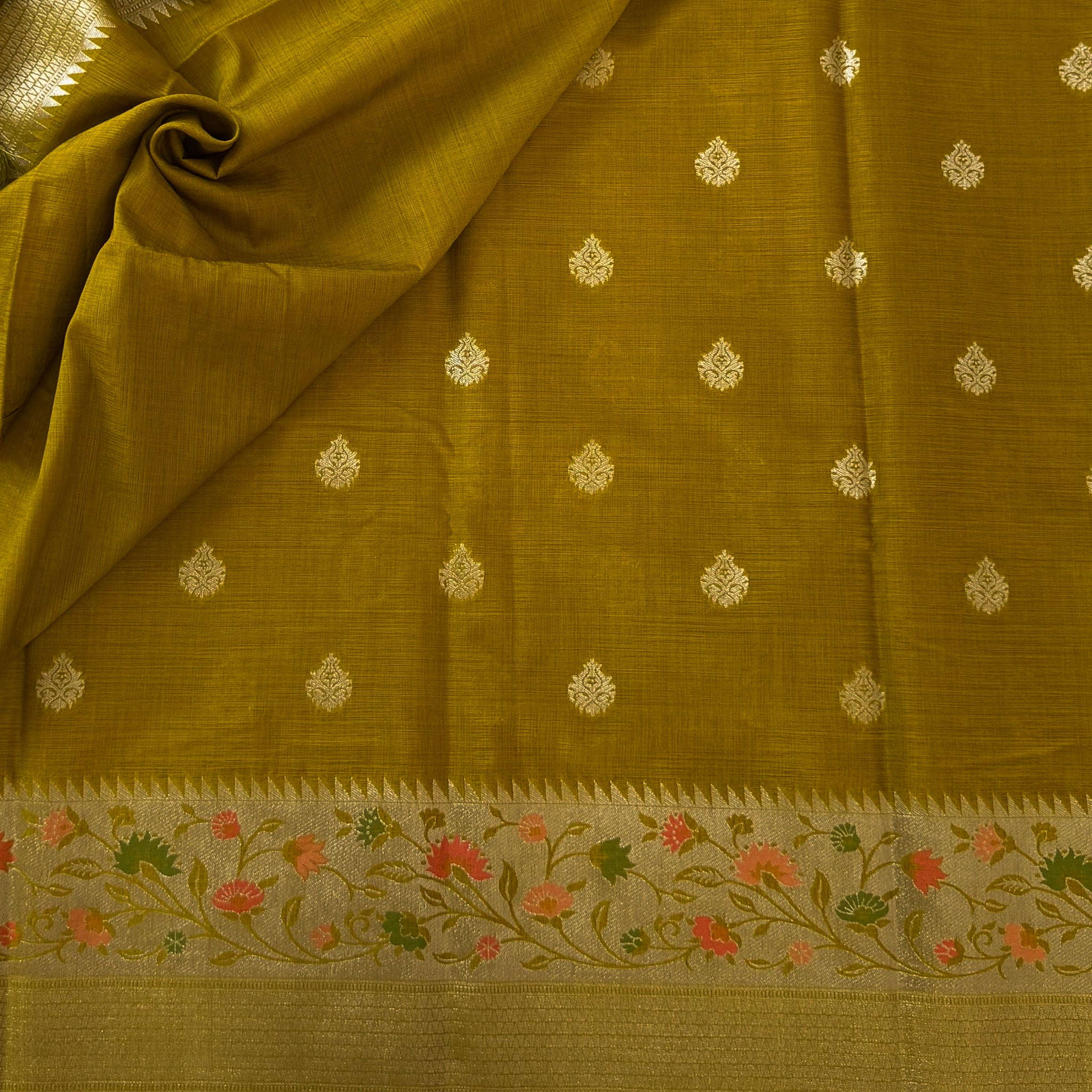 Olive Green Brocade Saree With Floral Pallu And Tassels Elegant
