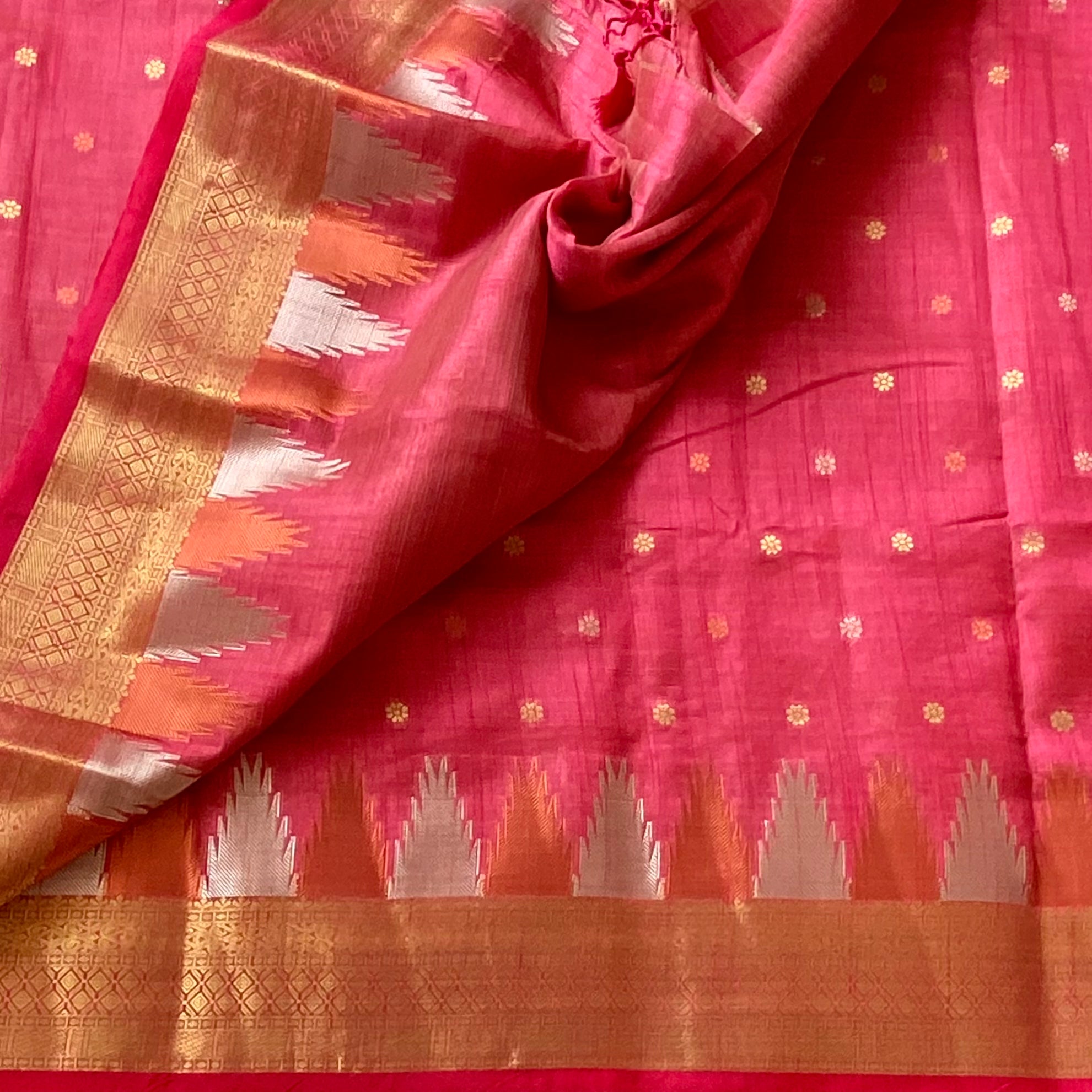 Kanakambari pinkish coral Gold soft tussar silk with temple borders