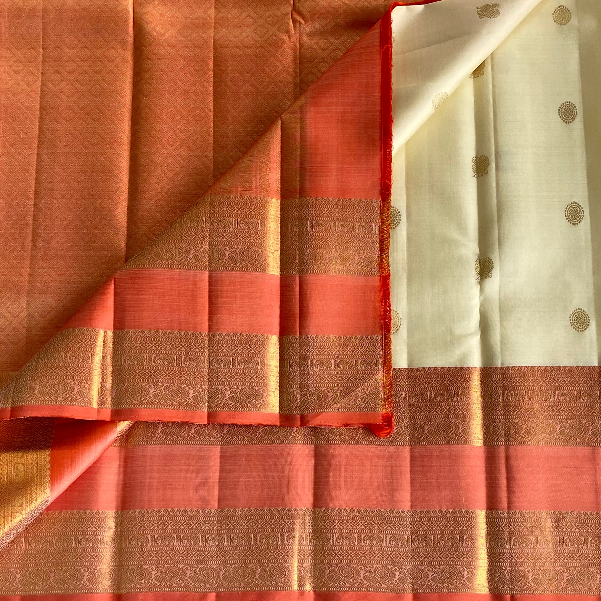 Masterweave Kanjeevaram in Pearl White & Dreamy Coral Pallu