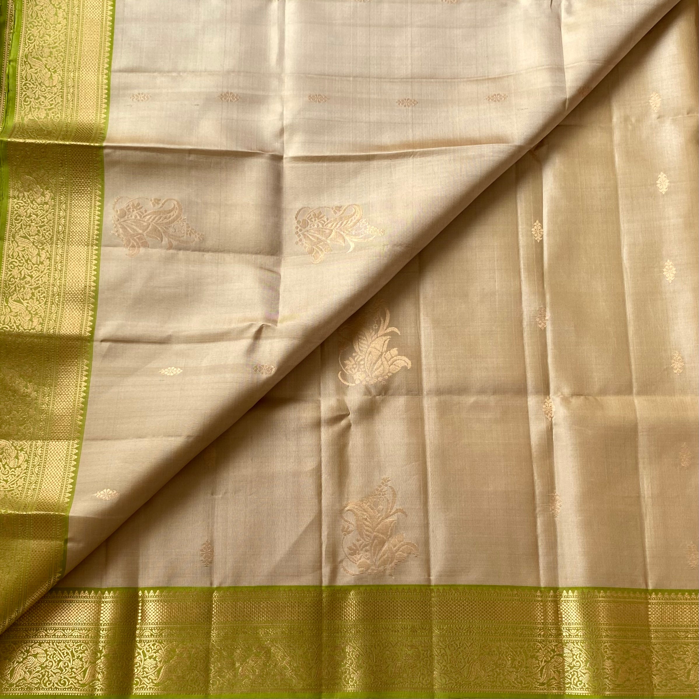 Elegant Pale Beige Lime Green Zari Woven Floral Traditional Saree