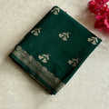 Emerald Green soft tussar with antique silver buttas and lotus borders