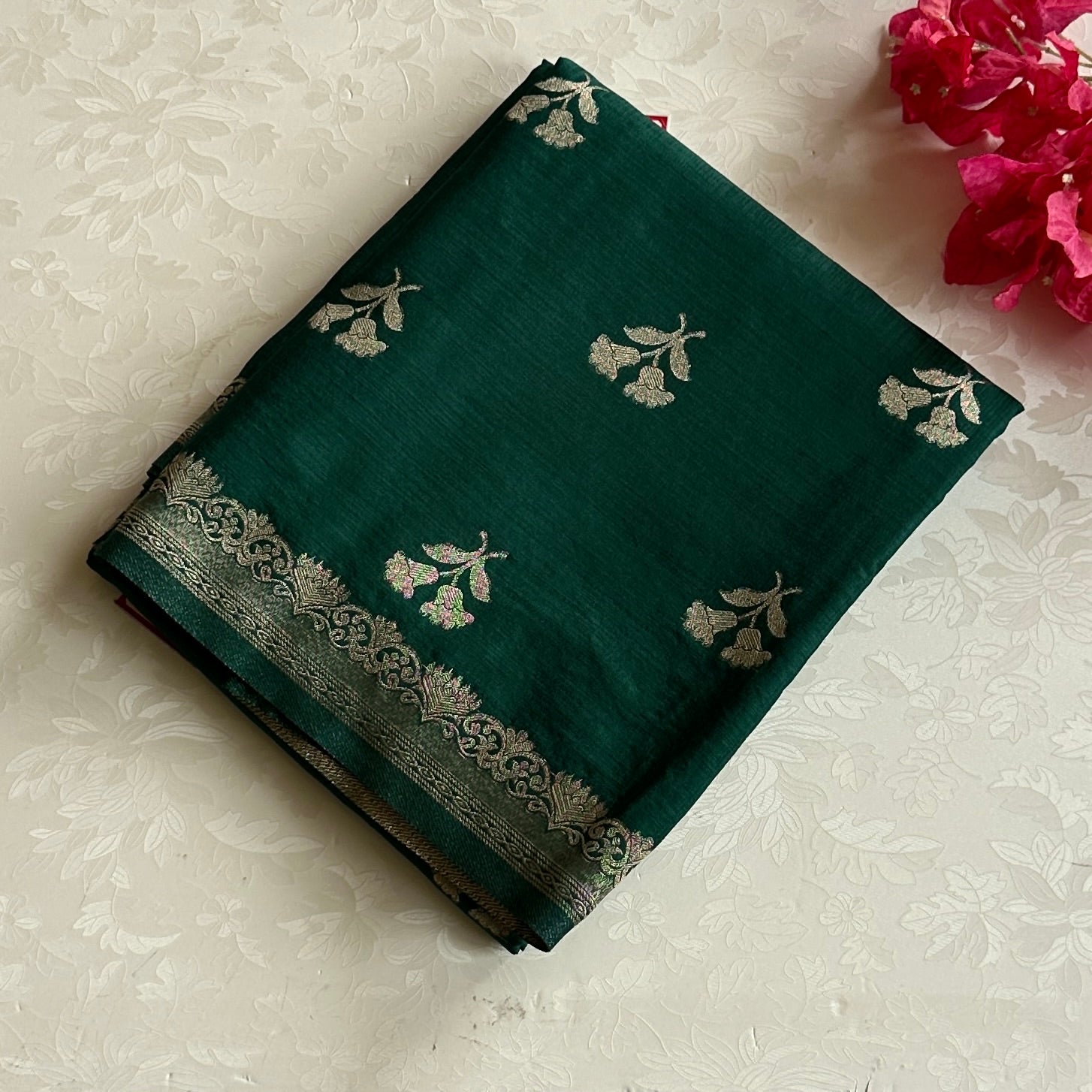 Emerald Green soft tussar with antique silver buttas and lotus borders