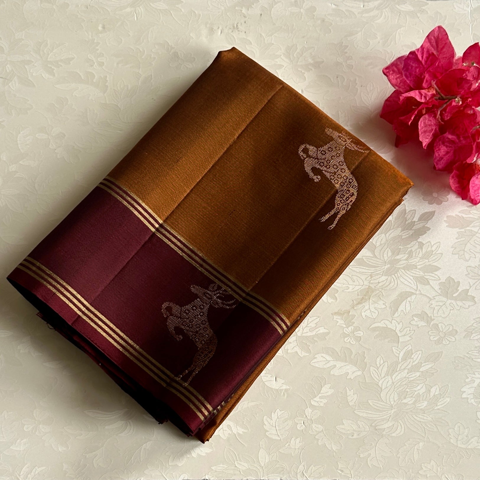 Magical rust with wine, maroon designer pure silk with dear motifs