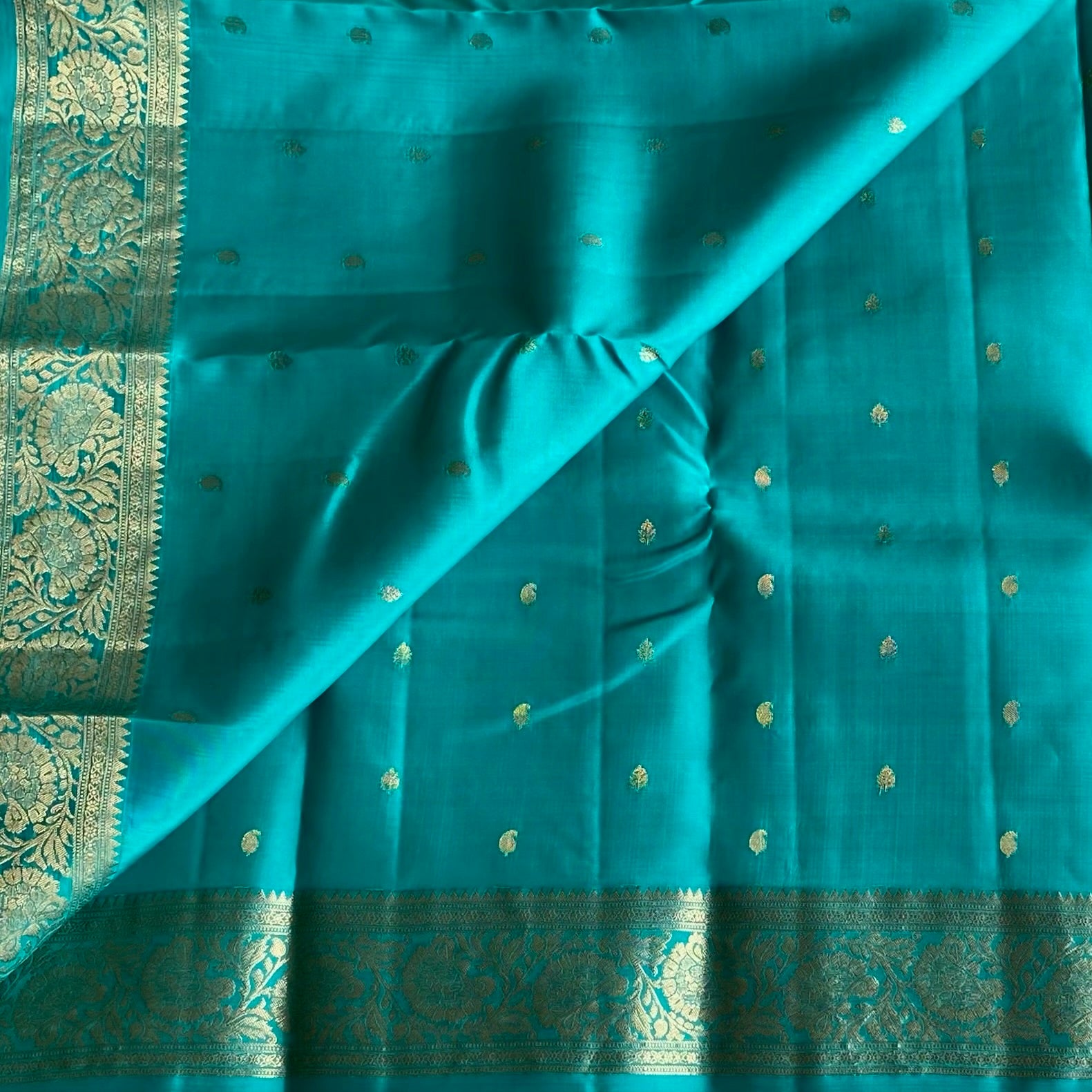 Dreamy Sea Blue And Gold Designer Pure Silk Saree With Floral Zari Border