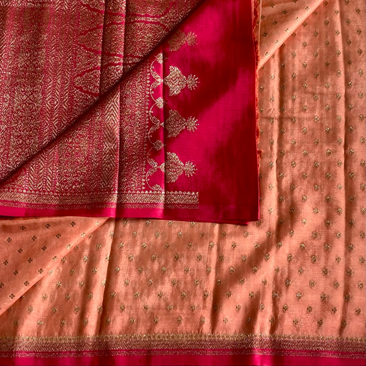 Blush Peach Banarasi Crepe Silk Saree With Rani Pink Pallu And Gold Zari